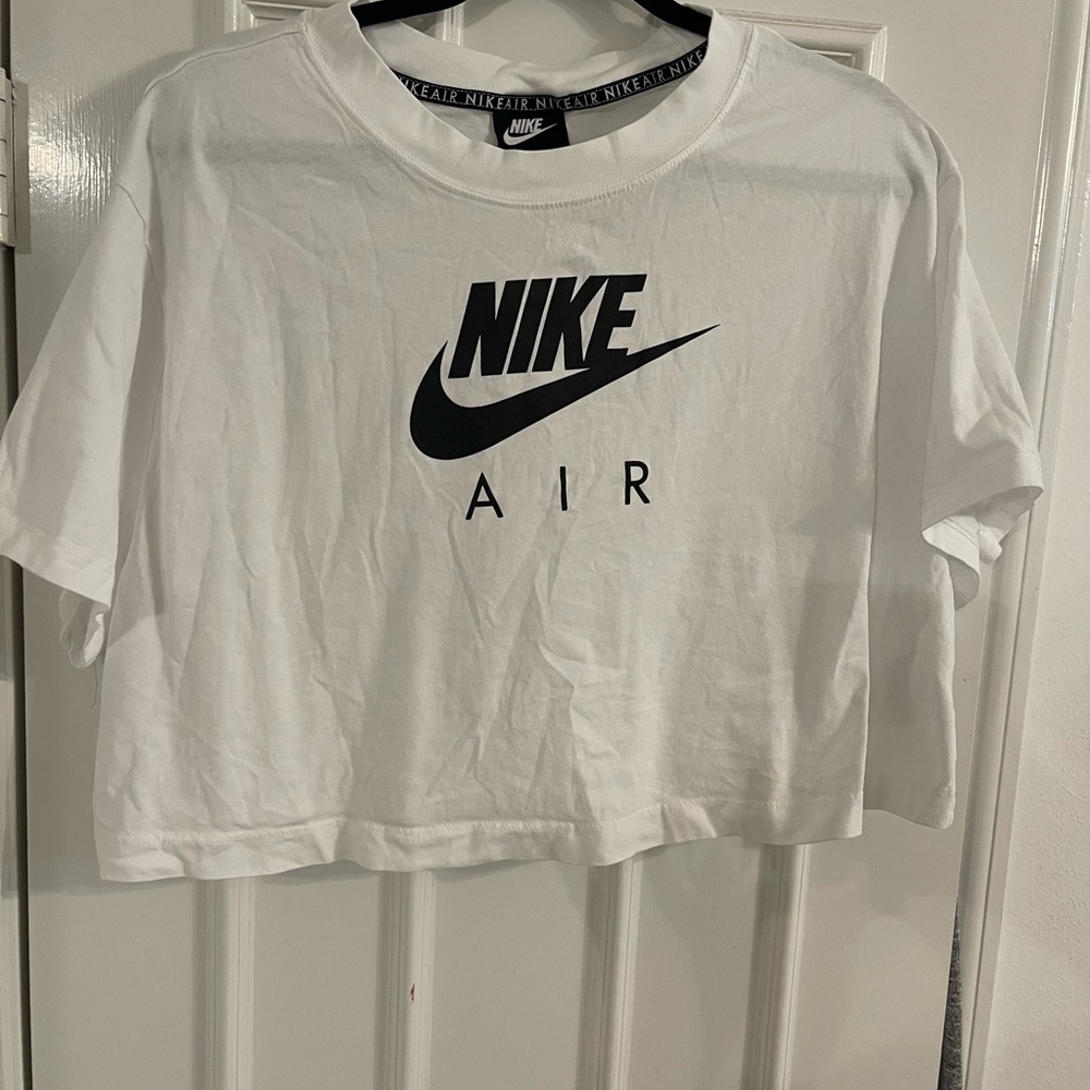 Nike crop top, new but my daughter took tag off before trying on.